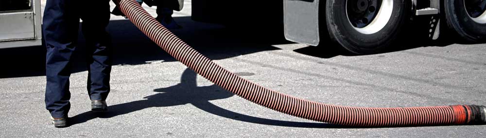 Roto-Rooter Sewer & Drain Service hose truck sewer